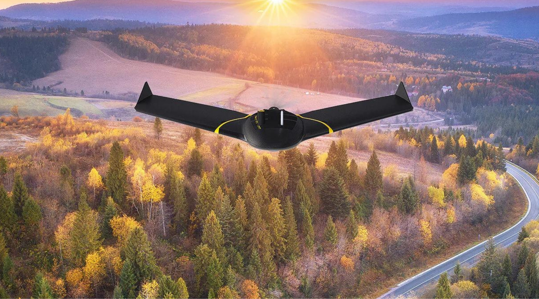 senseFly eBee drone flying above the field