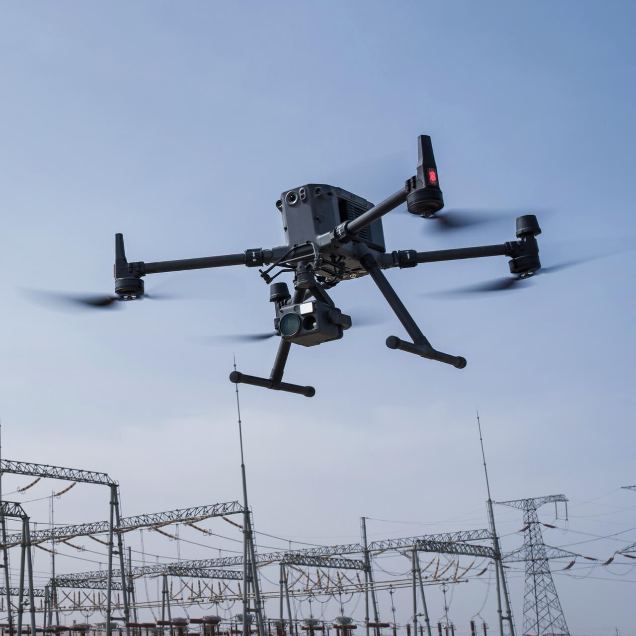 DJI Matrice 350 RTK drone inspecting powerlines during flight