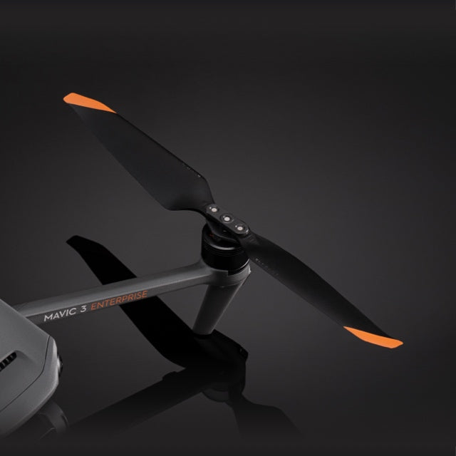 DJI Mavic 3 Enterprise drone with orange-tipped propellers in flight