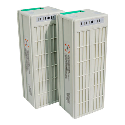 Two Inspired Flight batteries standing upright side by side.